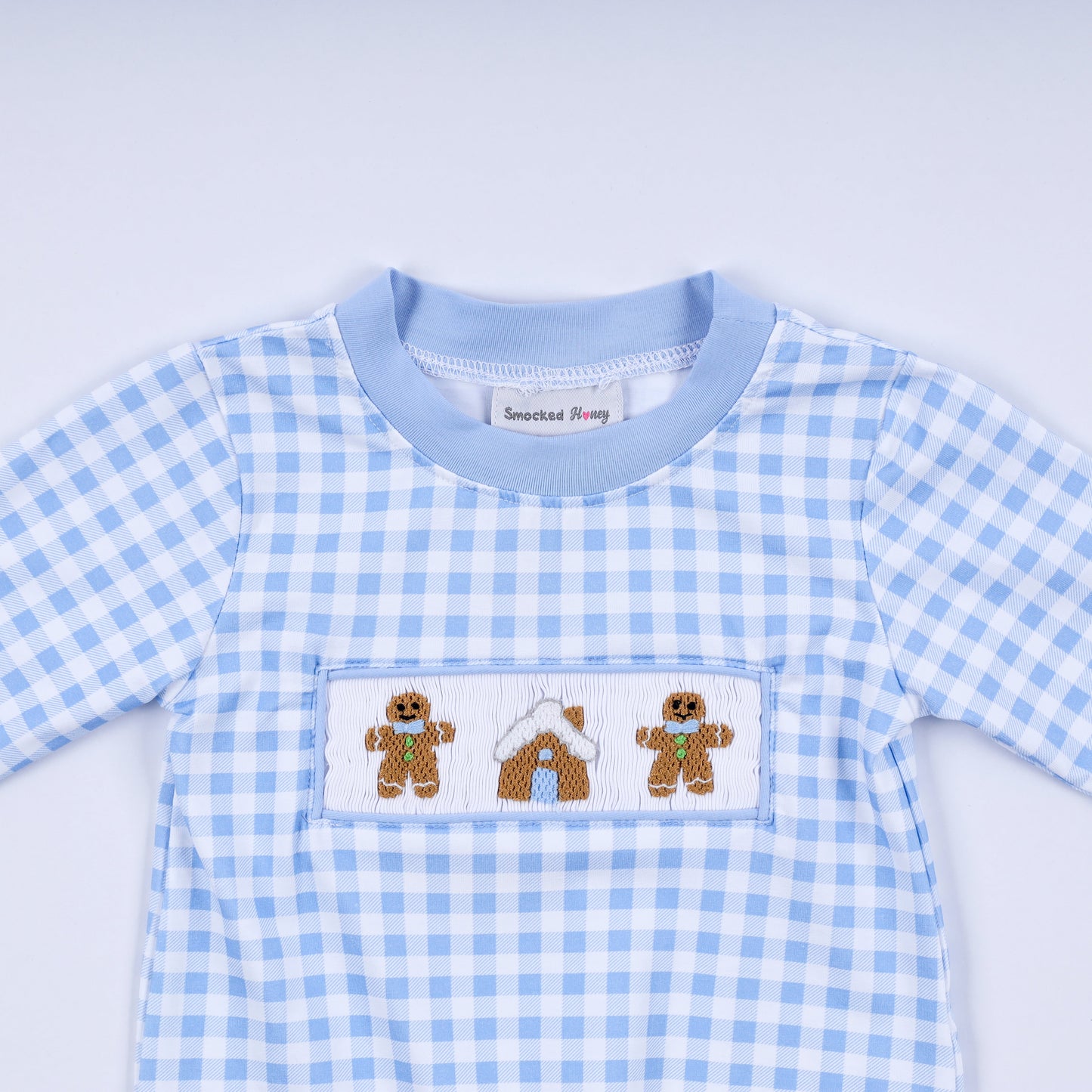 Blue gingerbread hand smocked gingham romper